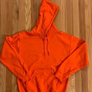 Bright orange sweat shirt. Brand new